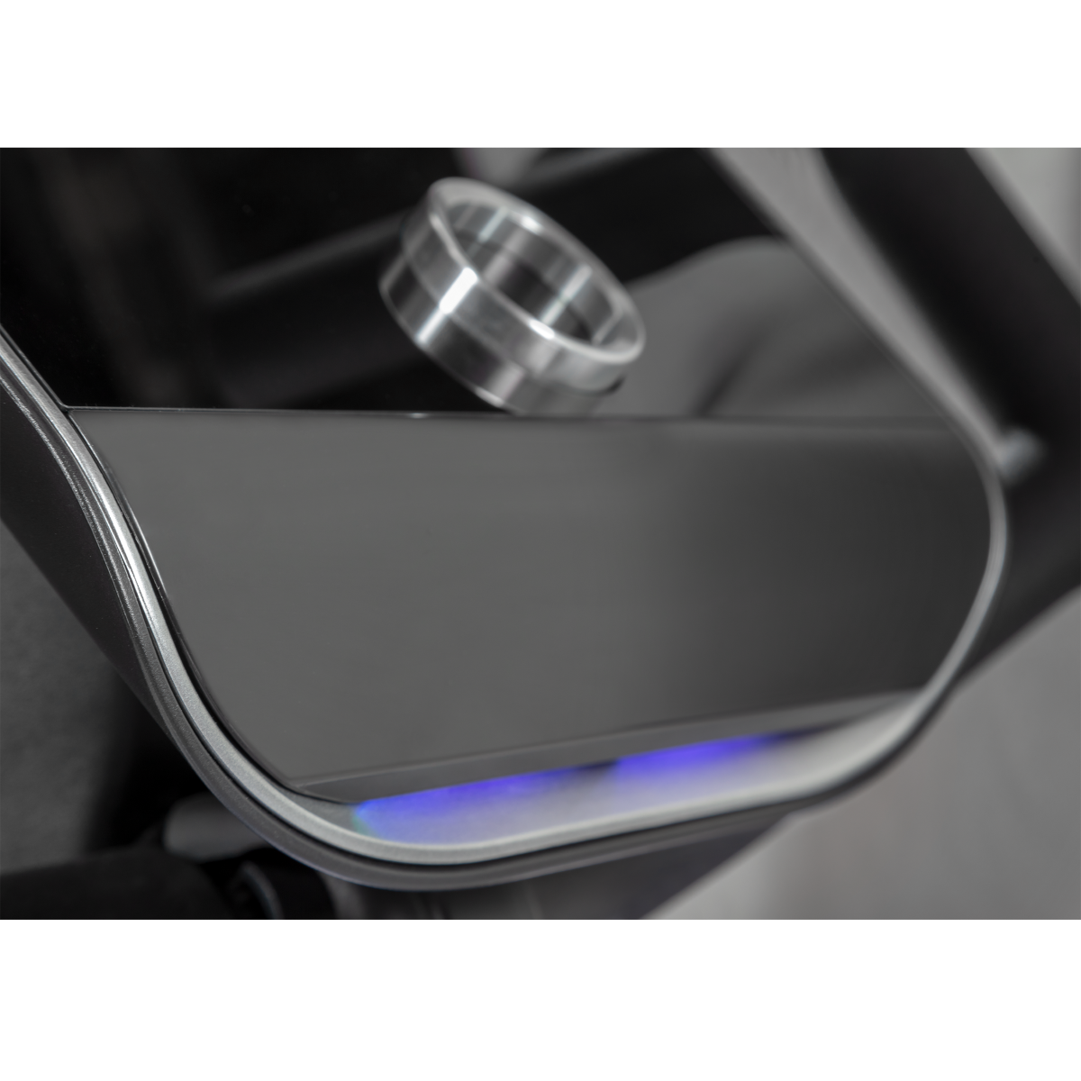 Close  up of console lighting effect and smart control wheel of the premium Flow Fitness B5s upright exercise bike