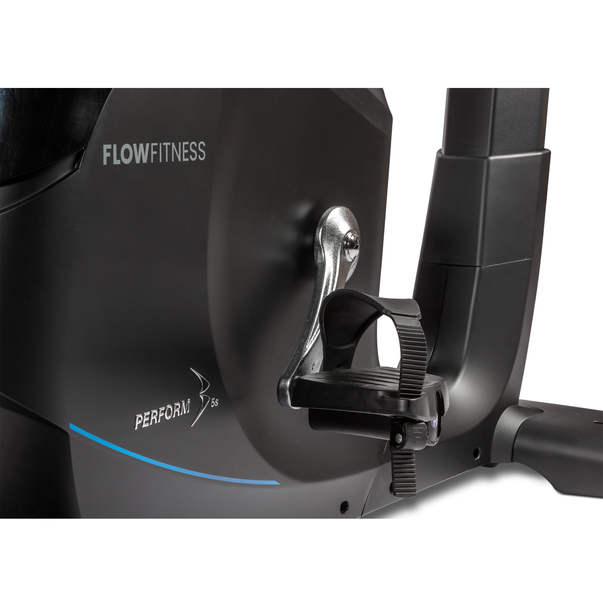 Close up of the Flow Fitness B5s bikes pedals which feature adjustable toe straps which enable to user to deliver power through the down phase and up phase of cycling. 