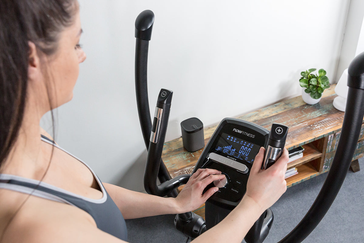 Flow Fitness DCT2500i setting up an exercise